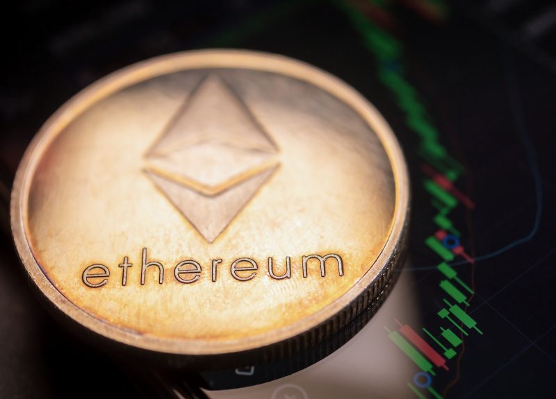 ethereum-coin-with-stock-graph-background-digital-2022-12-16-03-08-25-utc.jpg